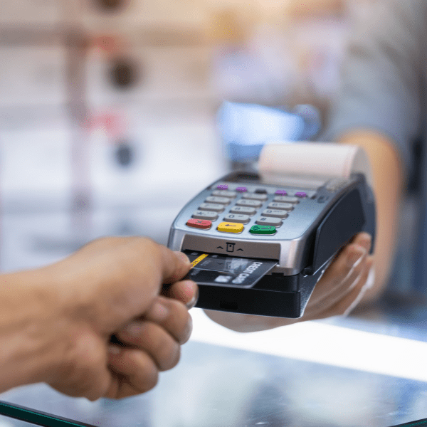 Credit card payment using a credit card machine.