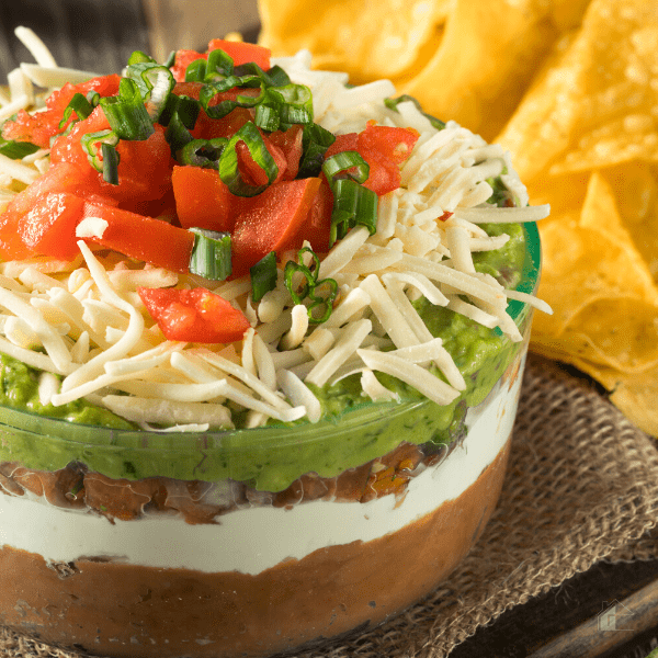 Homemade layer dip with beans sour cream gaucamole