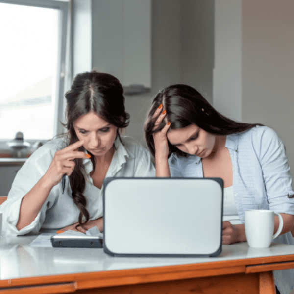 Mother and daughter having debt problems.