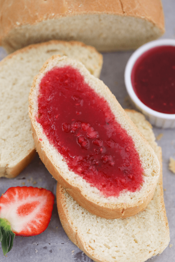 Pan Sobao topped with strawberry jelly.