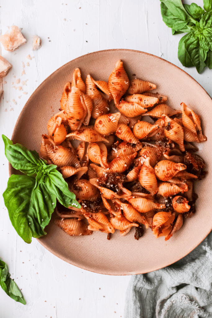 Photo of sun-dried tomatoes in pesto pasta