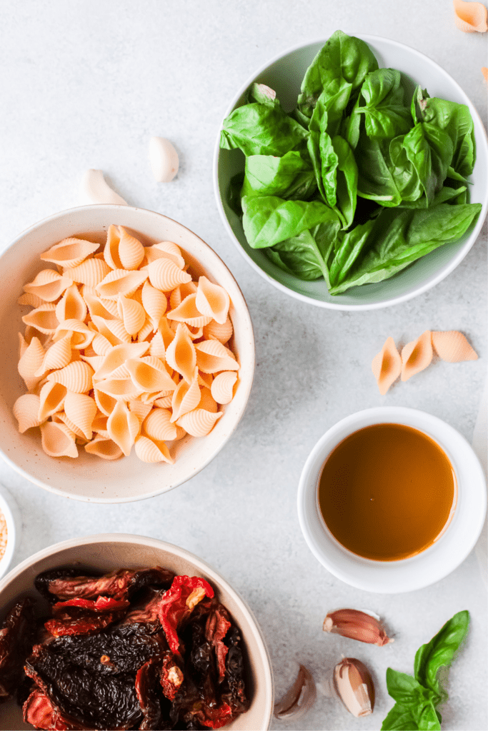 Ingredients to make sun-dried pesto salad.