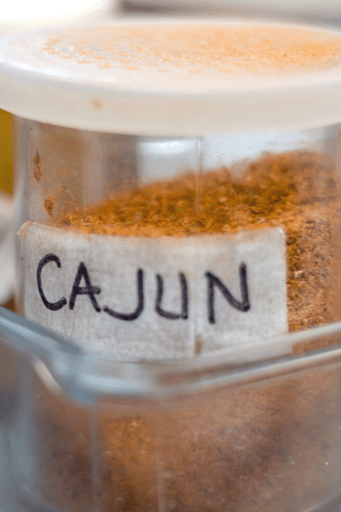 Close up Cajun seasoning bottle with labeled cajun
