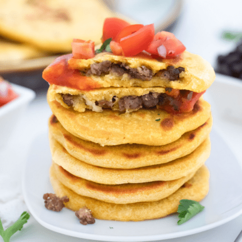 Ground beef pupusas plated.