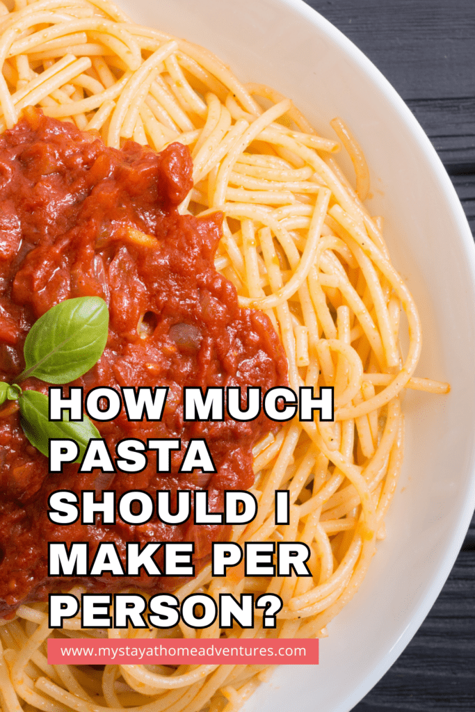 Italian Spaghetti with tomato sauce and basil on top with text "How Much Pasta Should I Make Per Person" at the bottom part