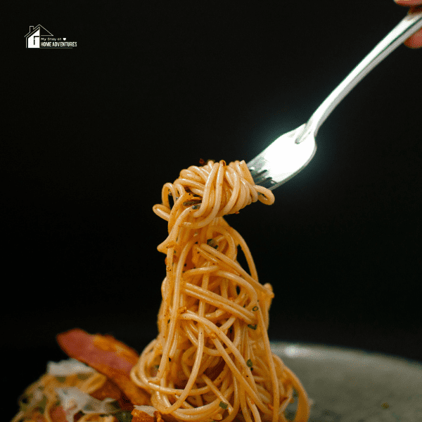 a fork with spaghetti pasta