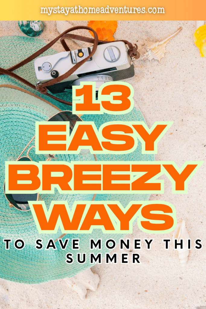 Beach items with camera and accessories arranged on sand showing easy ways to save money while enjoying summer activities.