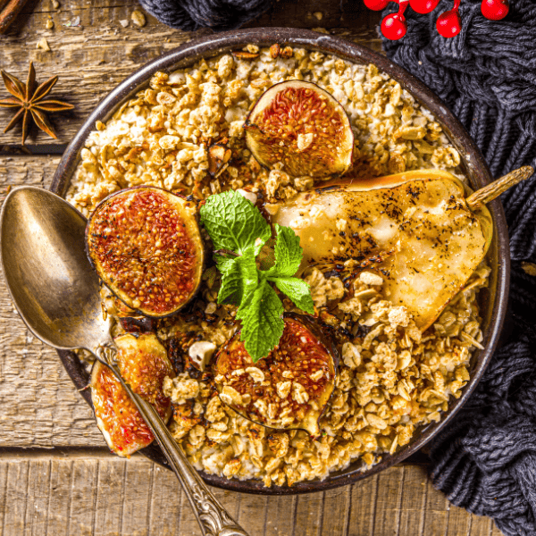 Fall breakfast oatmeal with seasonal grilled baked fruits, pear and figs.