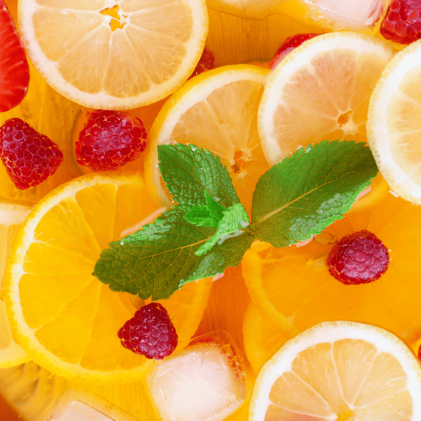 frutiy punch in glass bowl.