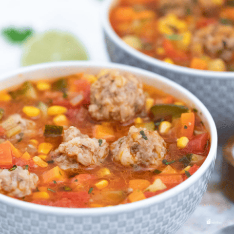 Mexican Meatball Soup in a white bowl