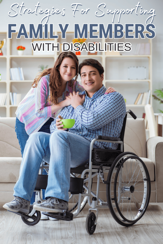 young wife and husband in wheelchair smiling at the camera.