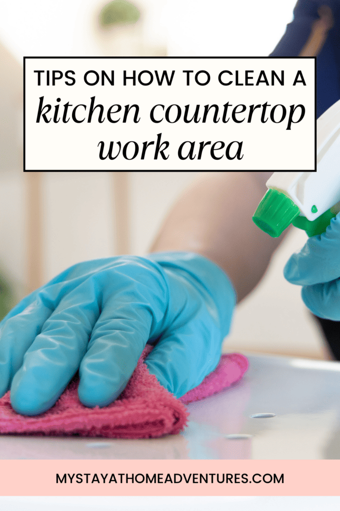 a hand with a cleaning cloth over a countertop with text: "tips on How to Clean A Kitchen Countertop Work Area"