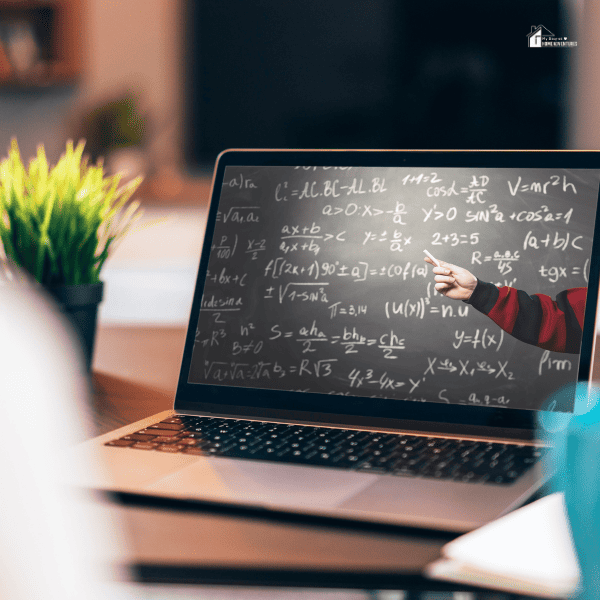 school blackboard on a laptop screen