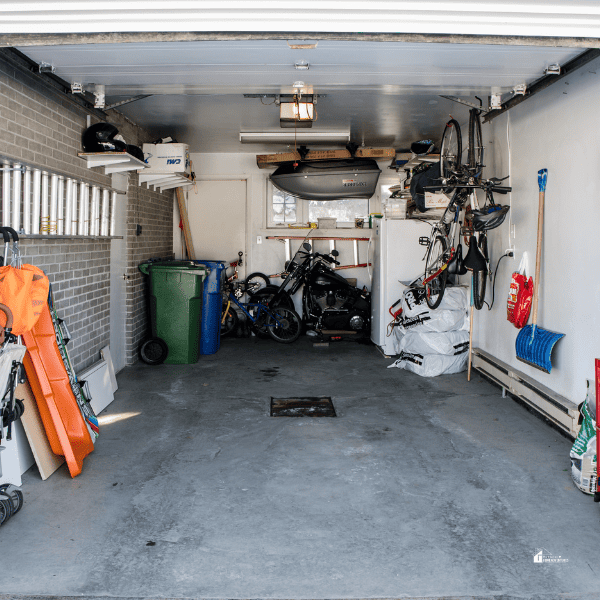 a residential garage with a lot of stuff