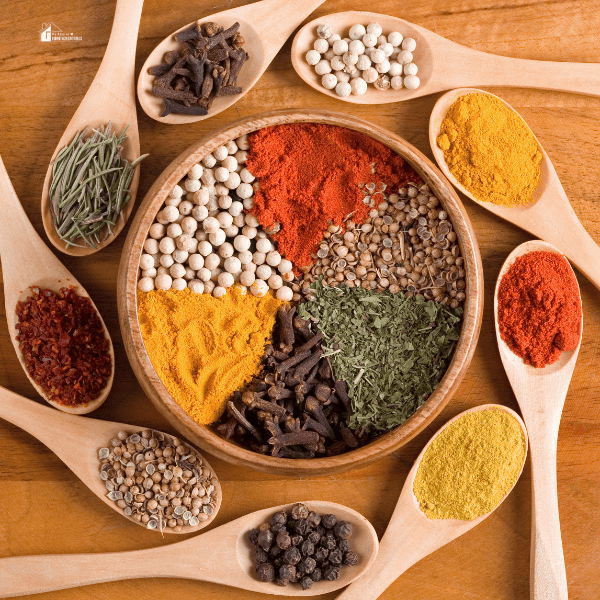 an image of different spices in spoons