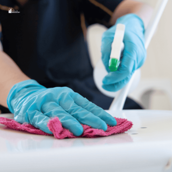 an image of someone cleaning a countertop