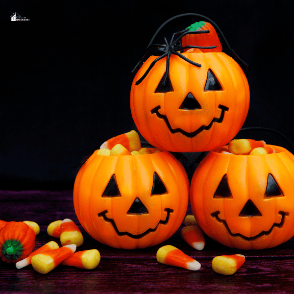 Halloween candies in a pumpkin bucket
