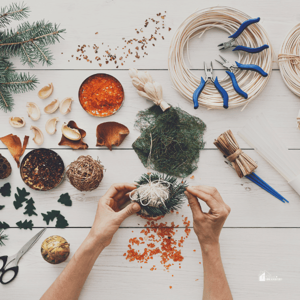 someone making DIY Christmas ornaments to sell on Etsy