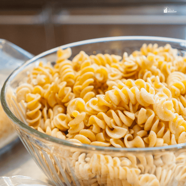 a bowl of cooked Rotini noodle