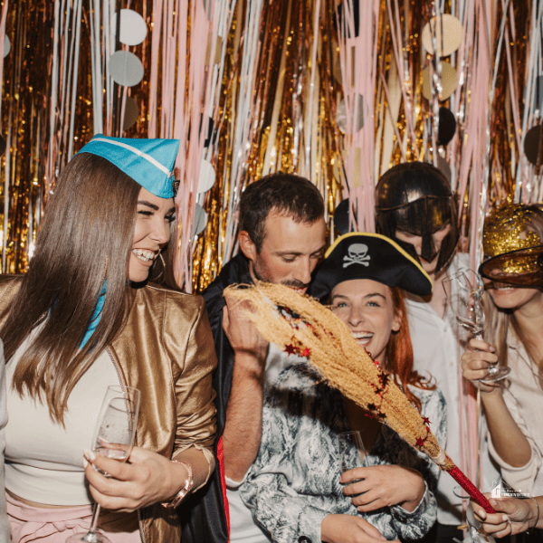 group of friends having fun in a Halloween party