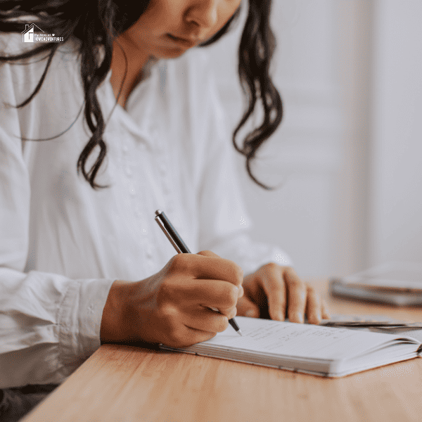 a college lady budgeting her cash