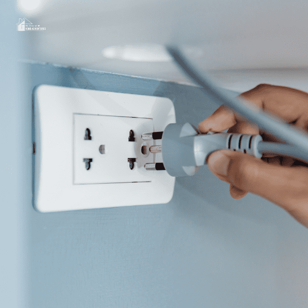 someone removing plug