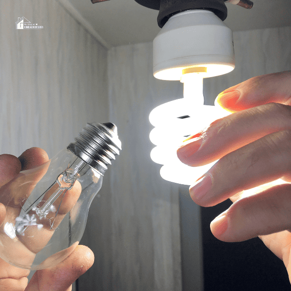 man changing bulbs