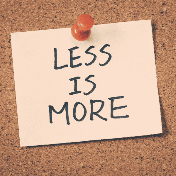 post it with written now that says less is more.