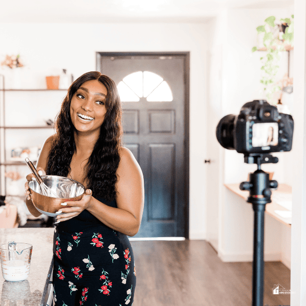 Woman Vlogging While Cooking at Home