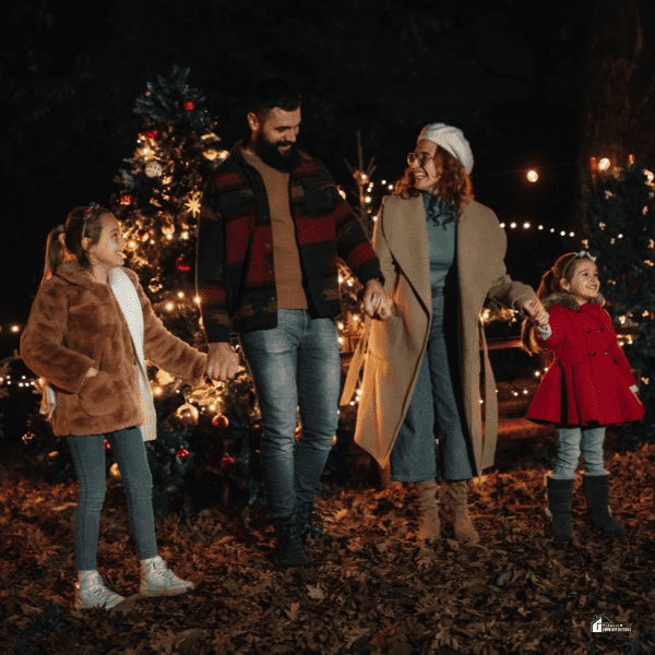 family enjoying Christmas lights