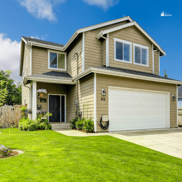 Two story house exterior with front yard landscape