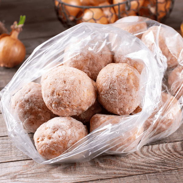 frozen meatballs in plastic bag on a table