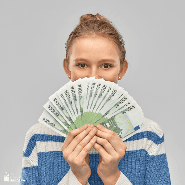 smiling girl with a lot of money