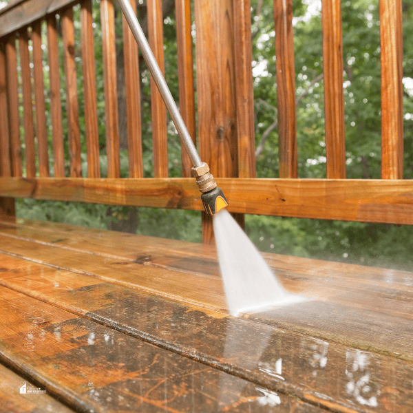 someone washing the deck