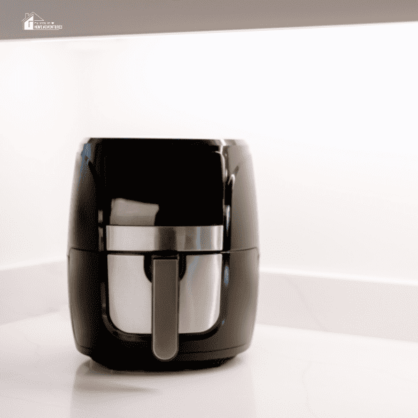 an image of air fryer in a kitchen corner