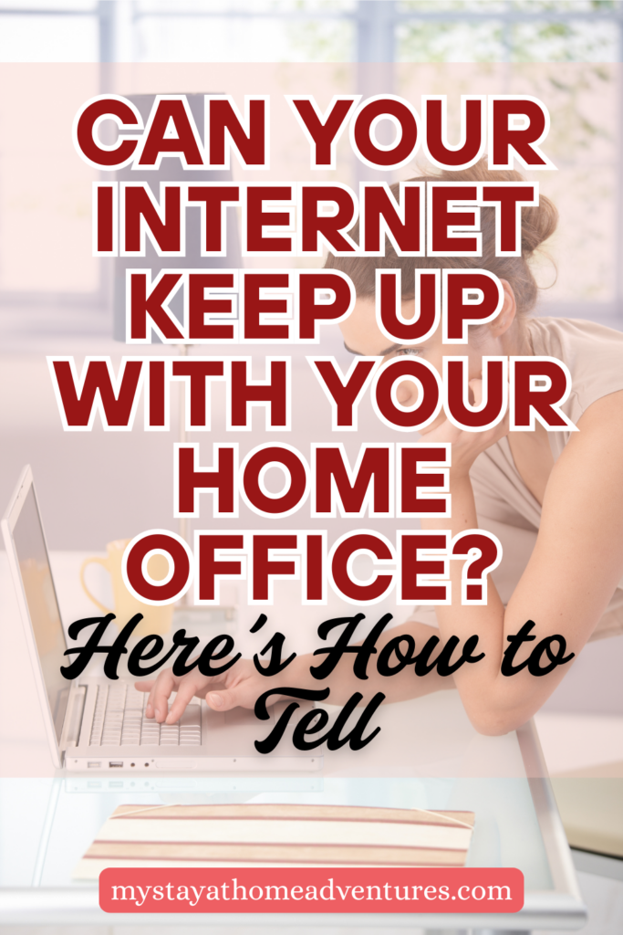 A woman working on a laptop in a home office environment.