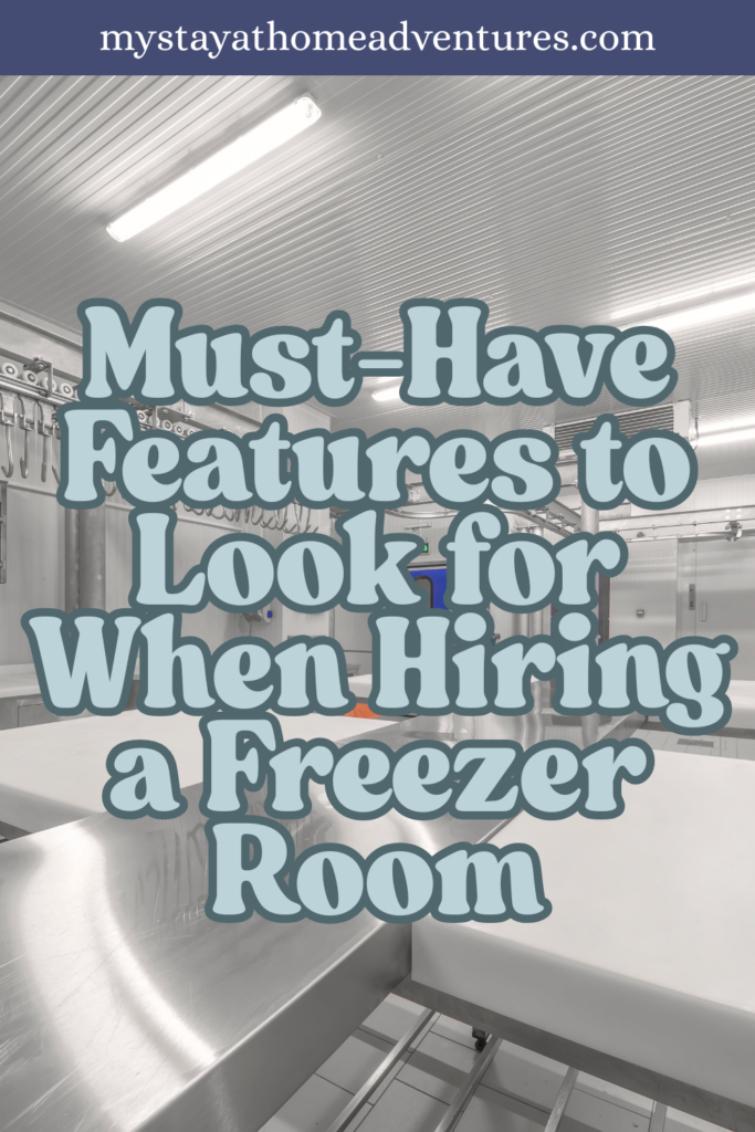 A clean, industrial-grade freezer room featuring stainless steel surfaces and bright overhead lighting in a food storage facility.