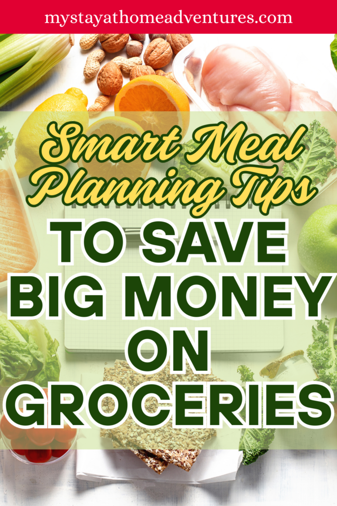 A flat lay of fresh fruits, vegetables, nuts, and grains surrounding a blank notepad and pen on a white surface.