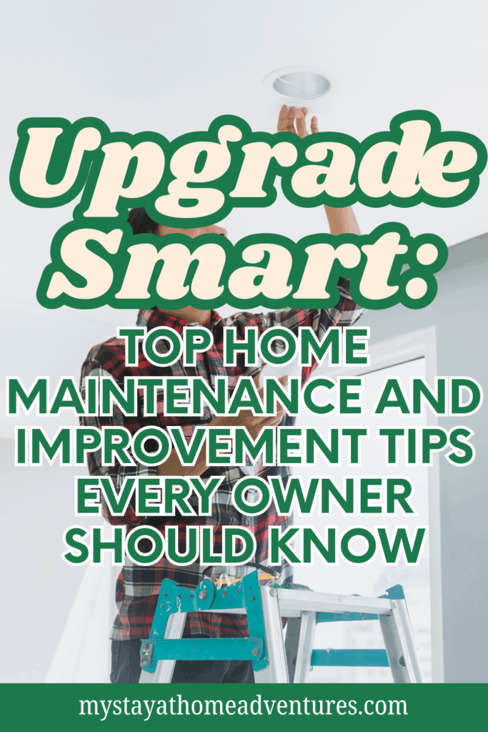 A homeowner standing on a ladder installs a ceiling light fixture as part of regular home maintenance improvements.