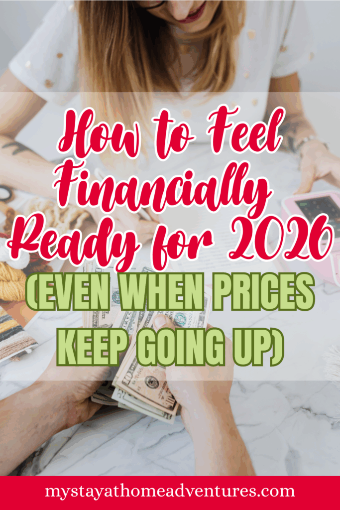 A close-up of hands holding cash with budgeting tools in the background, representing financial readiness for the future.