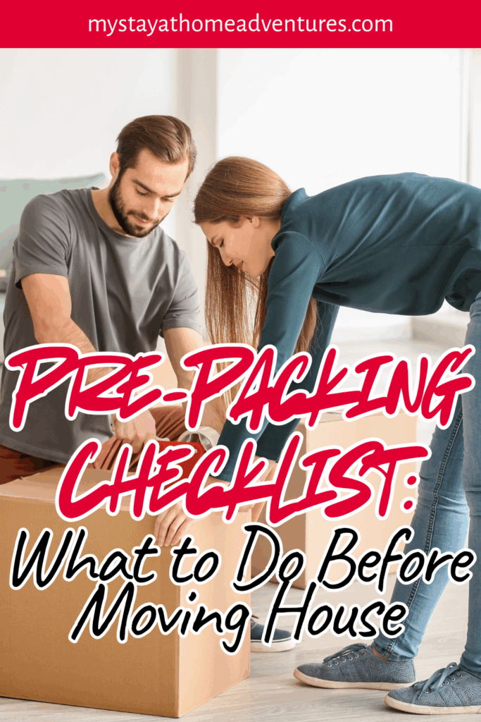 A man and woman pack a cardboard box together in a bright room surrounded by moving supplies.