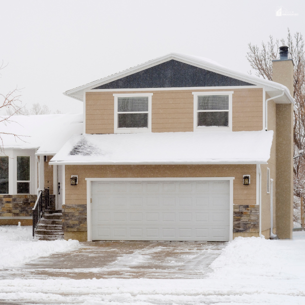 A snow-covered home highlighting the importance of winter-ready exterior upgrades for energy efficiency and cost savings.