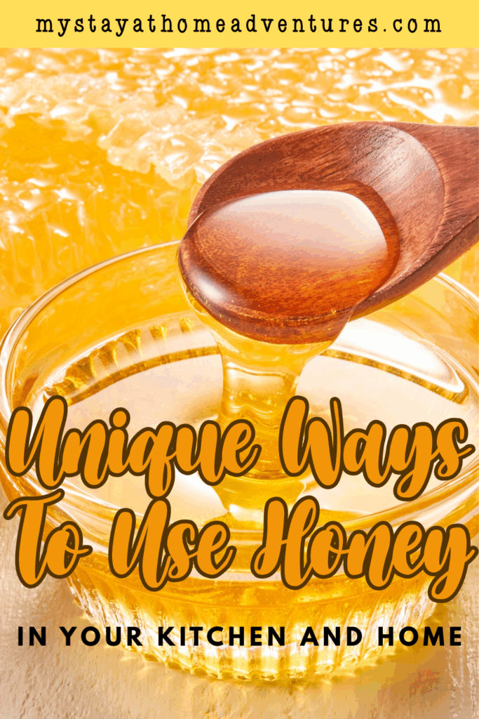 A wooden spoon scoops golden honey from a clear glass bowl, with a honeycomb background glistening in the light.