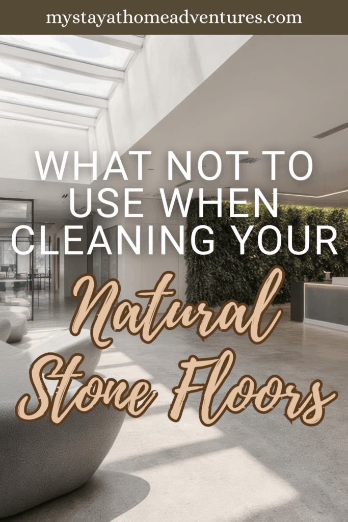 A sleek indoor space with a polished natural stone floor and skylight brings in natural light over contemporary furniture.