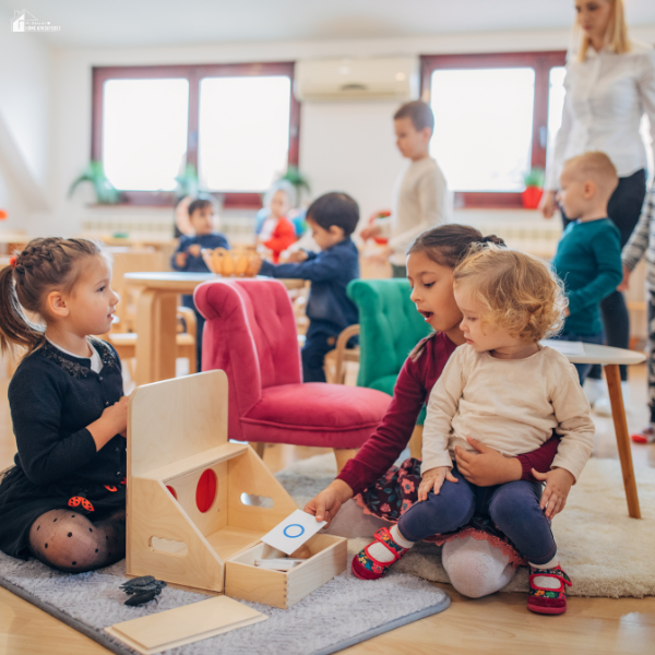 Children in a preschool classroom engage in play-based learning activities that promote curiosity and collaboration.