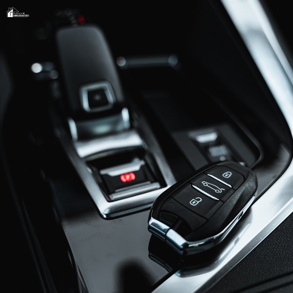 A car key fob rests on a center console, highlighting the importance of reliable automotive locks.