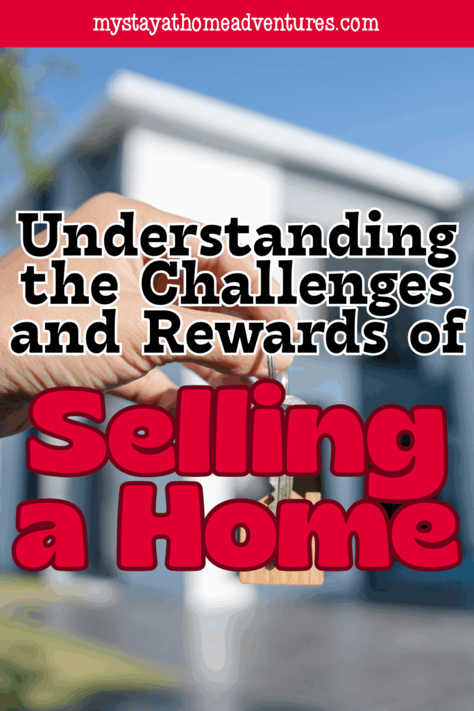 A hand holding a house key in front of a home symbolizes the emotional and financial journey of navigating the challenges and rewards of selling a home.