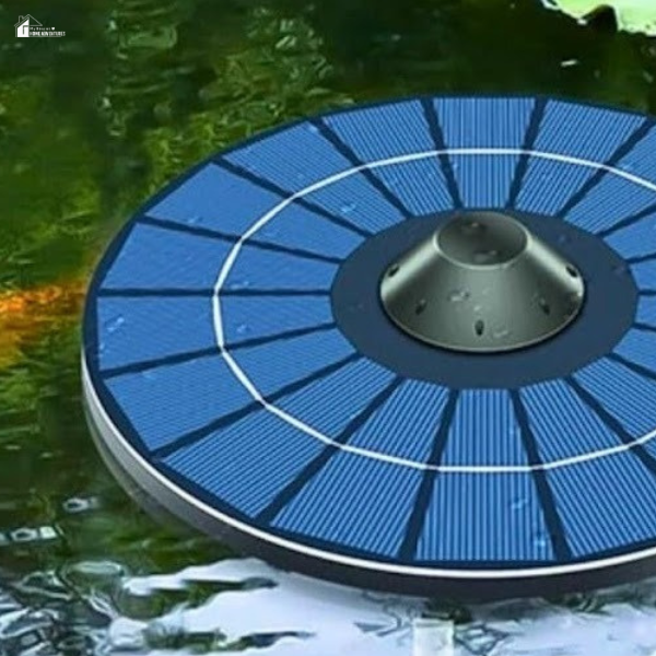 A close-up view of a circular solar pond aerator floating on water with visible ripples and oxygen bubbles.