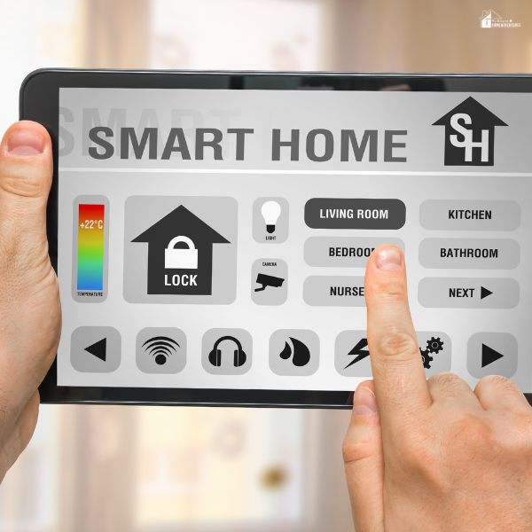 A person using a touchscreen smart home control panel with lock and room access options.