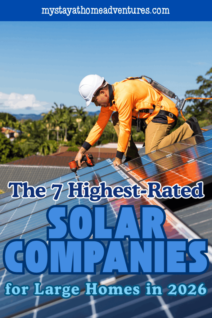 A technician in safety gear installing solar panels on a roof, representing reliable solar companies for large home installations.